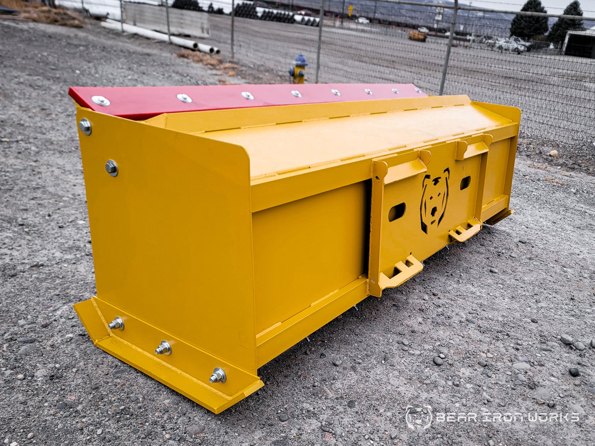 snow pusher attachment for skid steers