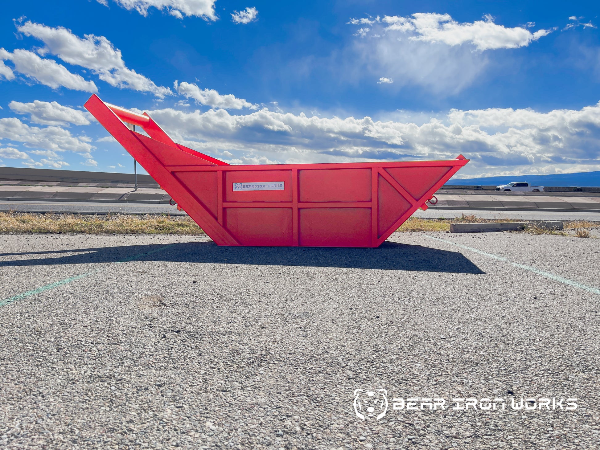 A backhoe sized bedding box for sale by Bear Iron Works.